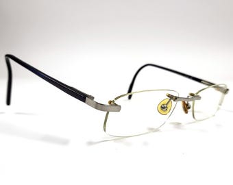 Vintage Occietto Eyeglasses Silver Blue Rimless Frames – 52-18-145