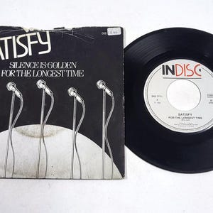 Satisfy – For The Longest Time / Silence Is Golden – Singolo in vinile 7" – Condizioni quasi perfette