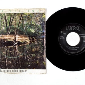 Peter Koelewijn – De Sprong In Het Duister / Klop&#39;t Af 7&quot; Vinilo NM/VG