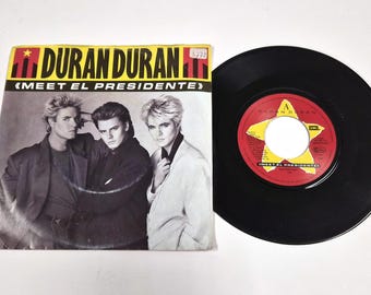 Duran Duran – Conoce a El Presidente / Vértigo (Haz la demolición) – 7" – 1987 – VG+