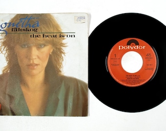Agnetha Fältskog – The Heat Is On / Man – Vinilo 7" – 1983 – VG+