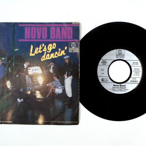 Novo Band – Let&#39;s Go Dancin&#39; – 7&quot; Vinyl Record 45 RPM – Ariola 1984 Pop VG+