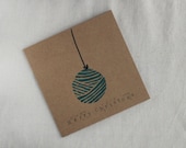 Lino print yarn ball bauble Christmas card- teal on brown