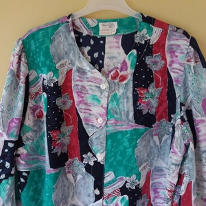 Vintage jaren 80 kleurrijke abstracte dame met hoed print midi lengte gezwollen mouw maat DE 44/46 of US L blouse tuniek