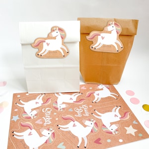 Unicorn party goodie bag set with sticker sheets that can be written on and paper bags in either brown or white