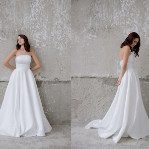 Simple satin wedding dress/Corset bodice/Long skirt with pleats, pockets and train/A-line/Strapless/Clean & modern/Plain bridal gown/Elegant