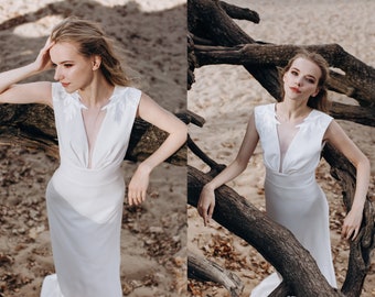 Simple crepe wedding dress with deep V-neckline, empire waist and A-line skirt