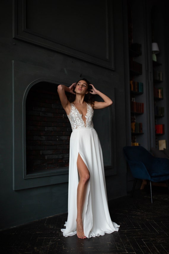 Simple lace wedding dress with nude bodice, plunging v neckline, open back, slit chiffon skirt, A-line silhouette, tulle bodice, ivory gown by Our Stories Bridal, Etsy