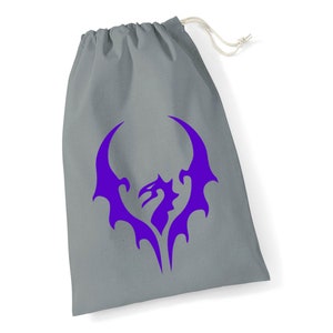 May include: A grey drawstring bag with a purple dragon design. The dragon is stylised and has wings that form a circle around the head.
