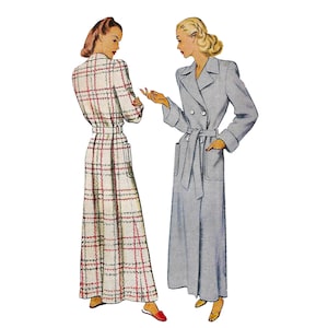 May include: Two women wearing long robes. One robe is a plaid pattern in red, white, and blue. The other robe is a solid light blue colour. Both robes have a belt and pockets.