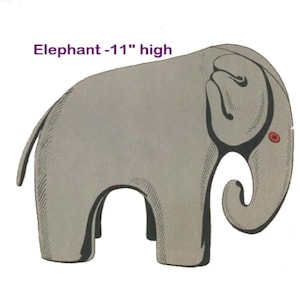 May include: A gray elephant illustration with a red dot on its eye. The text "Elephant - 11" high" is above the elephant.