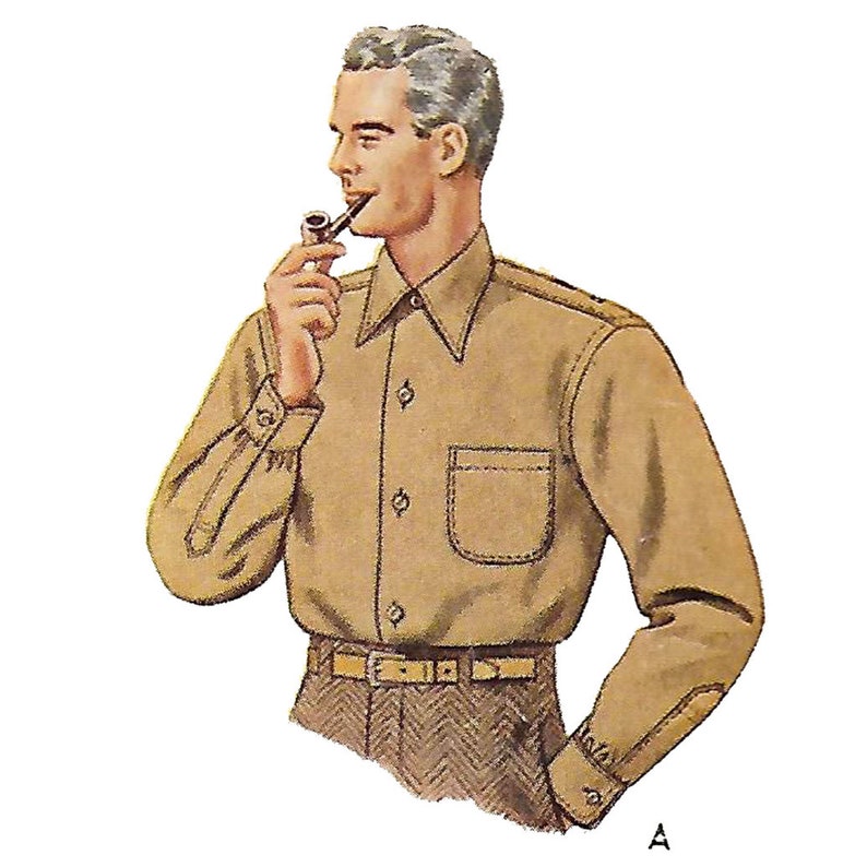 May include: A man wearing a light brown long-sleeved shirt with a button-down collar and a single chest pocket. He is holding a pipe in his mouth and looking to the side.