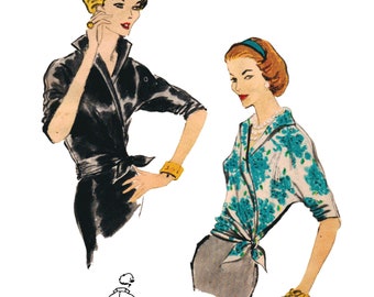 May include: Two women wearing vintage style blouses. The woman on the left is wearing a black blouse with a tie at the waist. The woman on the right is wearing a blue and white floral blouse with a tie at the waist.