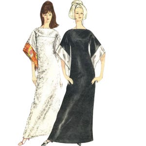 May include: Two women wearing long, flowing dresses. The dress on the left is white with a patterned sleeve. The dress on the right is black with white trim on the sleeves.