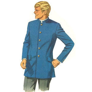 A vibrant blue mandarin-collared longline jacket. The jacket features a hip-length design, long sleeves with buttoned cuffs, and multiple buttons down the front.  The fabric appears smooth and the overall style is sleek and modern.