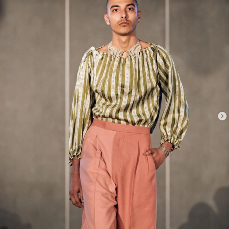 Vintage sewing pattern photo of a man wearing 50's slacks.