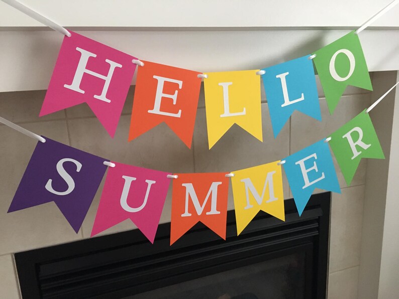 May include: A colorful banner with the words "Hello Summer" in white letters on a rainbow background.