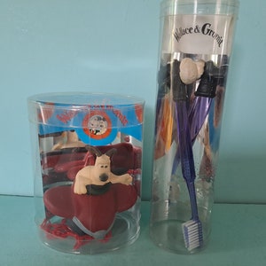 Wallace e Gromit Shaun vita da pecora Tappo da bagno galleggiante e spazzolino Vintage nella confezione originale, Aardman 1989