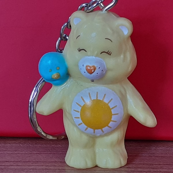 Kenner Care Bear Funshine avec porte-clés Blue Bird, clé, chaîne, porte-monnaie, bague, Dangler Original Rare vintage AGC 1983 Figure