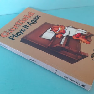 ガーフィールド猫がまた遊ぶ ジム・デイビス ヴィンテージ漫画 コミックストリップ ペーパーバック 1990年 ラヴェット出版