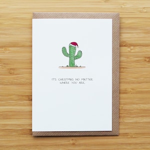 Biglietto di auguri natalizio con cactus di Natale
