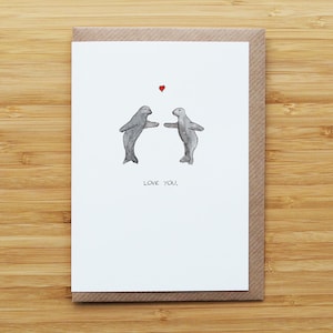Tarjeta de focas de amor
