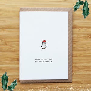 Weihnachtskarte mit kleinem Pinguin