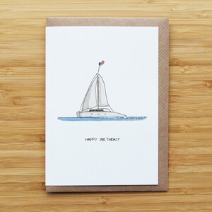 Tarjeta de cumpleaños en catamarán