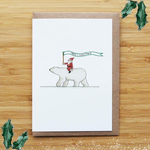 Cartão de Natal do Papai Noel Montando um Urso Polar