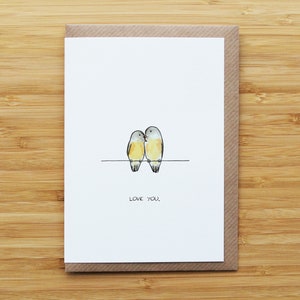 Tarjeta de pájaros en una línea