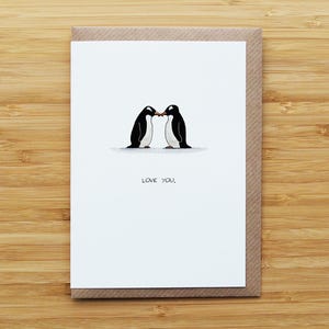 Tarjeta de beso de pingüino