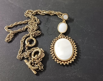 Vintage, signed, Monet gold tone with three tier mother of pearl pendant necklace. 15" gold tone chain. Fast, free shipping to U.S.A.