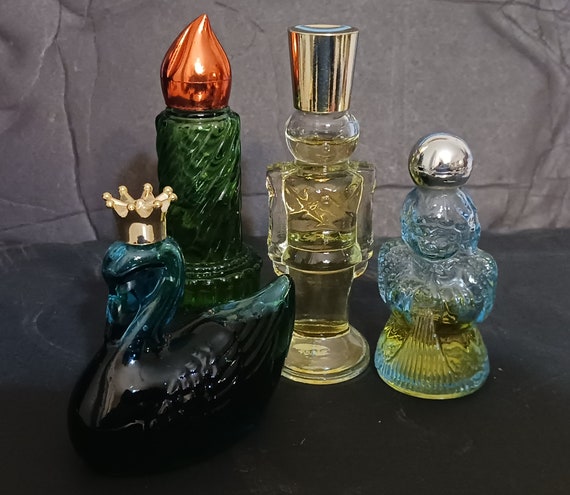 Vintage Avon Perfumes. Four Different Bottles. Christmas