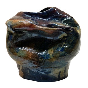 Raku fired decorative ceramic pot