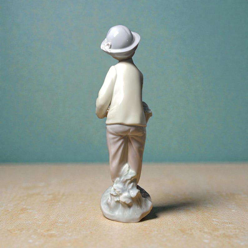 Lladro "Little Gardener" ("Boy with Basket & Umbrella"), model number 4726 image 7