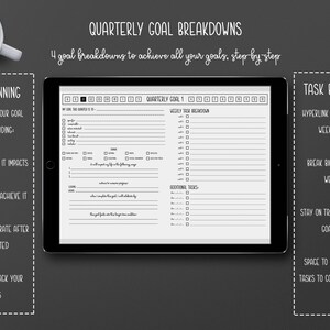 May include: A digital planner on a tablet with the title "Quarterly Goal Breakdowns." The planner includes sections for goal planning, task breakdowns, and weekly overviews. A cup of coffee sits in the upper left corner.