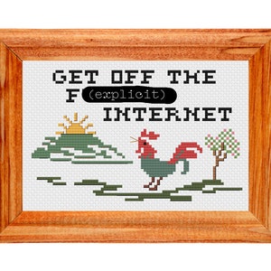 May include: A framed cross-stitch design with the text "GET OFF THE F (explicit) INTERNET". The design features a rooster, a sunrise, and a tree with pink flowers.