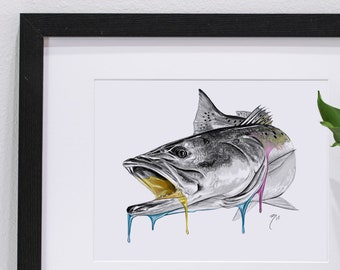 May include: A black and white drawing of a fish with colorful paint dripping from its mouth. The drawing is framed and matted in white. The frame is black.