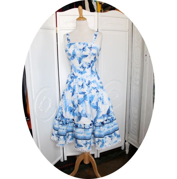 white dress with blue butterflies