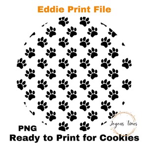 May include: A circular design featuring numerous black paw prints on a white background. The text "Eddie Print File" is at the top, with "PNG Ready to Print for Cookies" at the bottom. The design is suitable for cookie decoration.