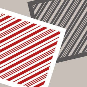 May include: Abstract geometric design with red and white stripes and grey and white stripes. The text "Joyous Times" is at the bottom of the image.