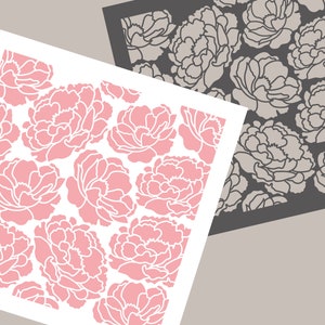 May include: Two overlapping squares with a floral pattern. The top square is gray with a white floral pattern. The bottom square is white with a pink floral pattern. The text "Joyous Times" is written in black at the bottom of the image.