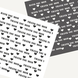 May include: Black and white printable sheet with the text "Thank You Mom" repeated multiple times with a heart symbol between each word. The text "Joyous Times" is at the bottom of the sheet.