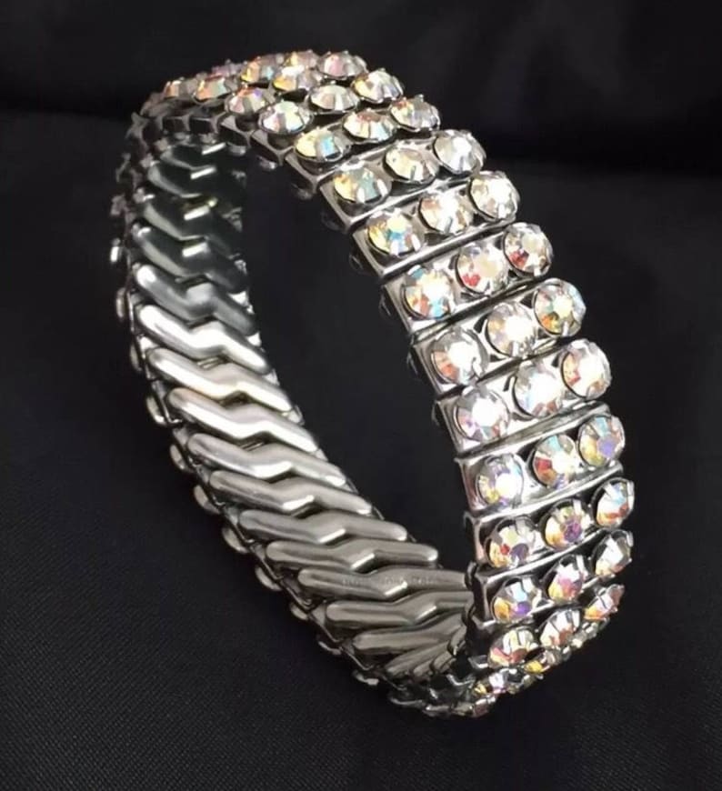 Glamorous 1950s silver tone rhinestone diamant\u00e9 aurora borealis cuff bracelet pin up