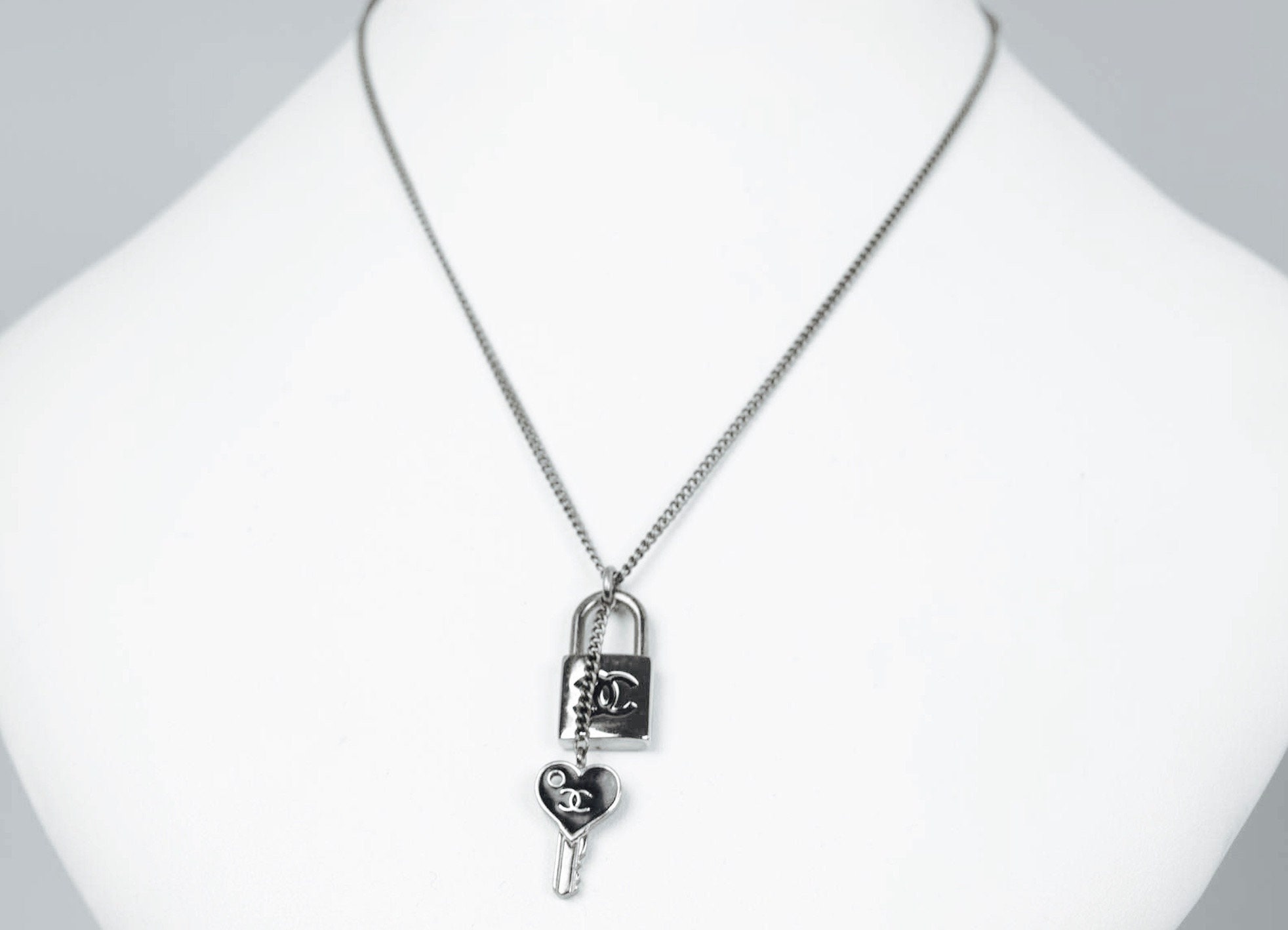 CHANEL CRYSTAL FILLED FLOATING CC HEART NECKLACE