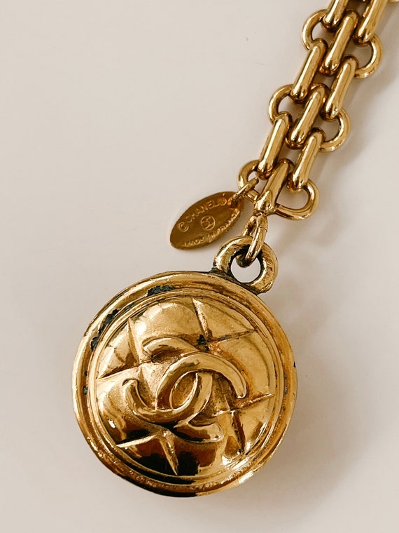 chanel gold and silver chain bag charm