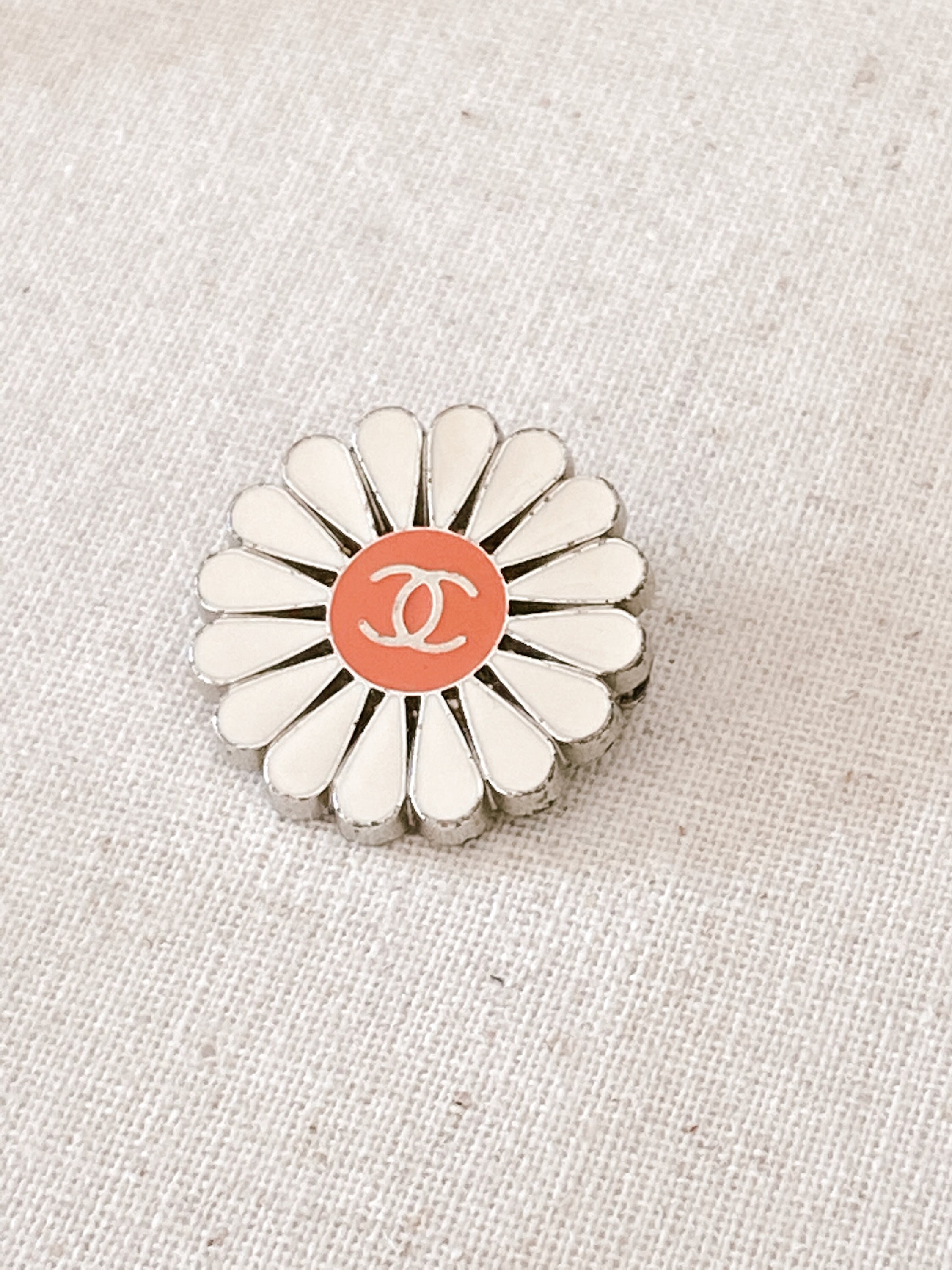 Sold at Auction: CHANEL WHITE LEATHER CAMELLIA BROOCH