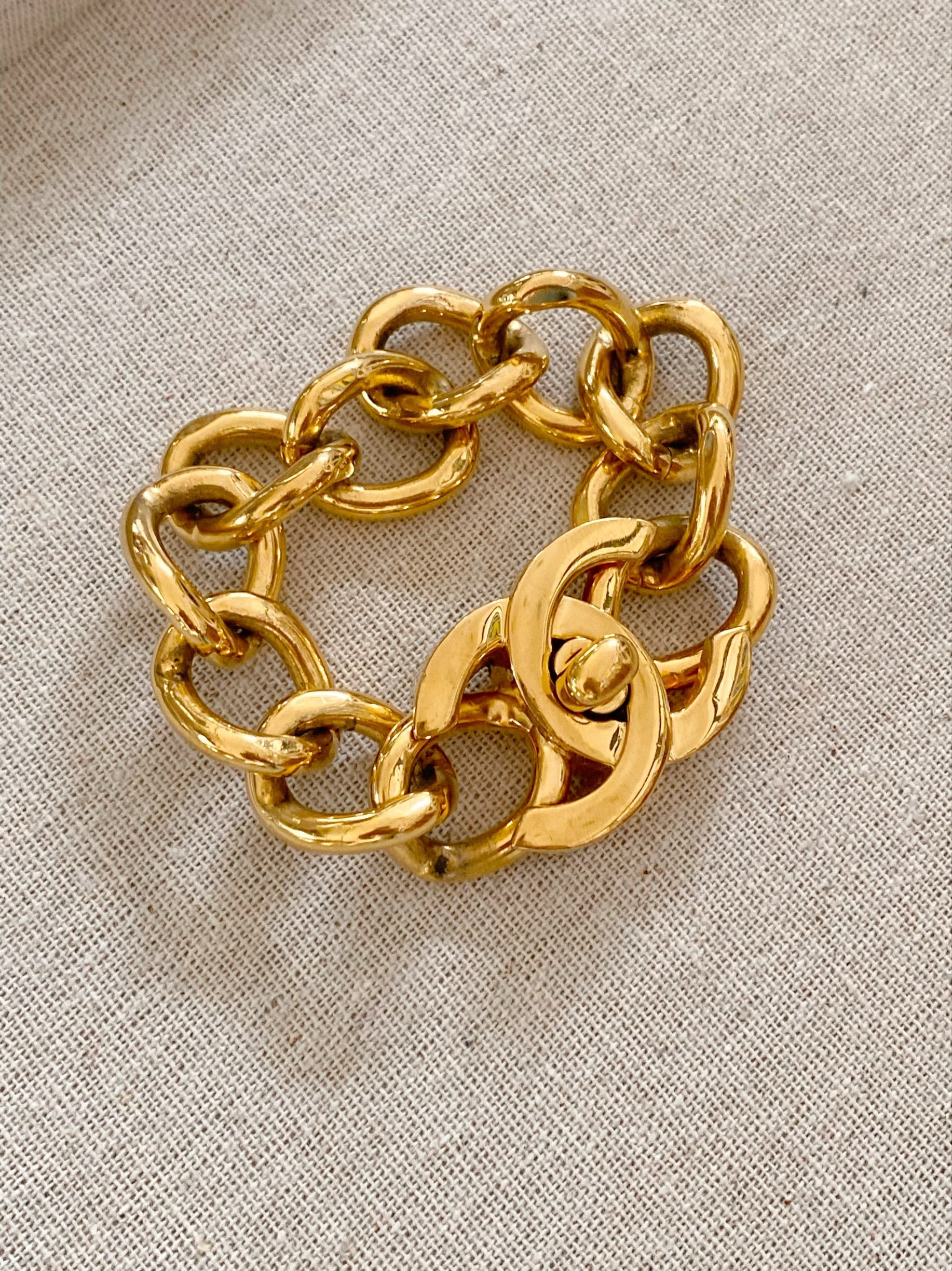 Vintage Chanel Bracelet CC Gold Turn Lock Cuff 97A – EYECATCHERSLUXE