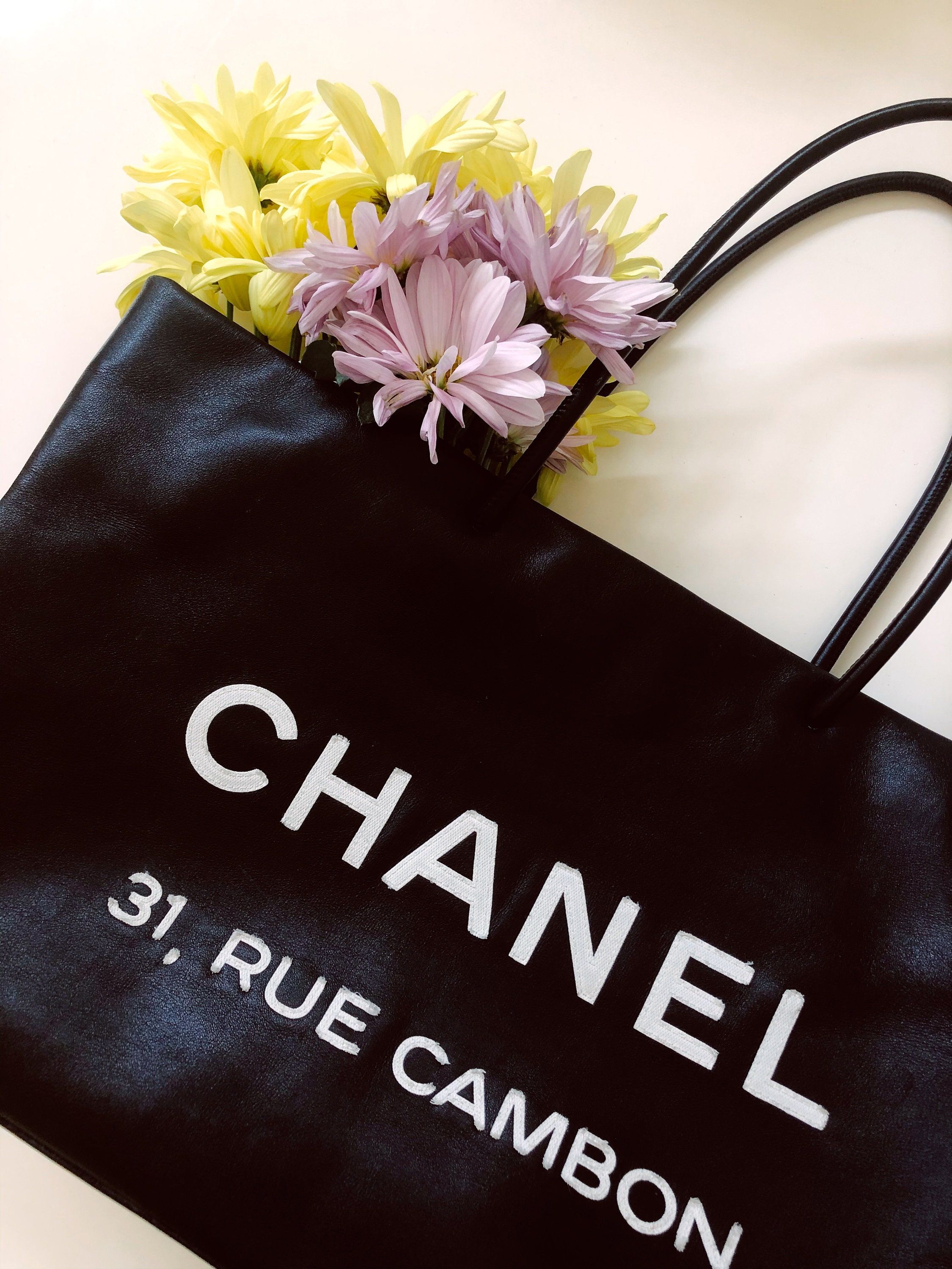 Chanel rue cambon White paper bags  Paper carrier bags, Paper bag, Chanel