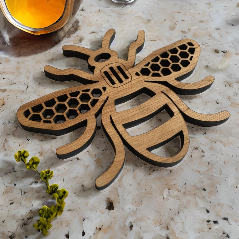 Manchester Bee Coaster on a marble worktop